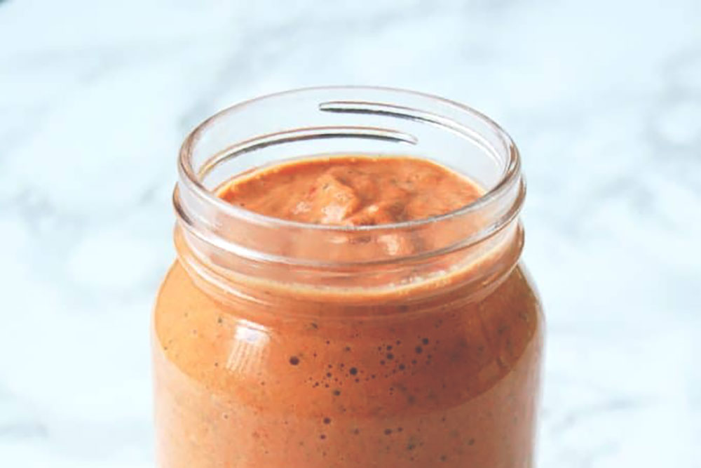 This nut-free Romesco sauce takes a slightly different spin on the traditional sauce with almonds, using hemp seeds instead.